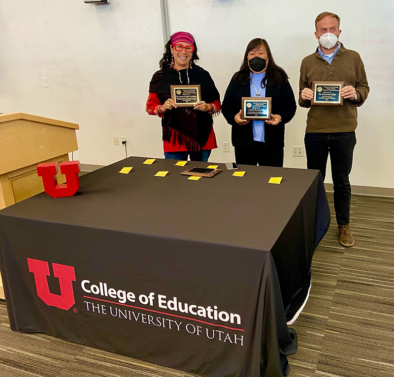 Drs. Gutierrez, Benally, and Hyres holding their awards